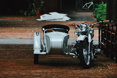 Motorcycle with sidecar parked on street