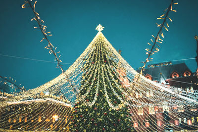 Low angle view of christmas tree against sky