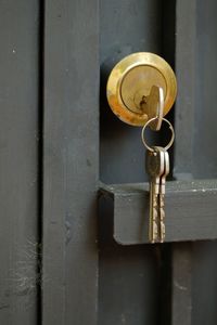 Close-up of key in door