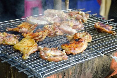 Close-up of meat on barbecue grill