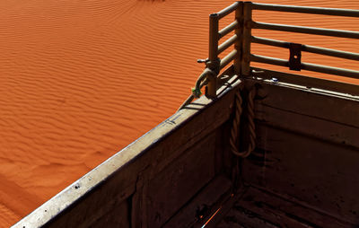 View from the platform of an off-road vehicle to the ripple marks in the desert sand of wadi rum