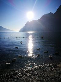 Scenic view of lake against sky during sunset