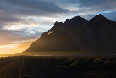 Scenic view of mountains against sky during sunset