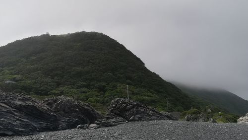 Scenic view of rocky mountains against sky