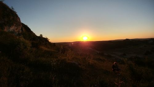 Scenic view of mountains at sunset