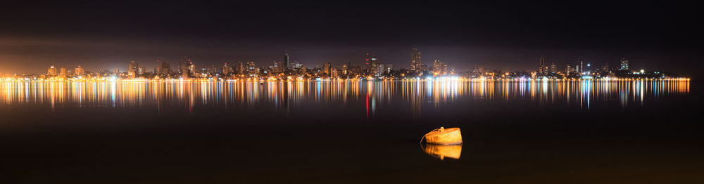 View of city lit up at night