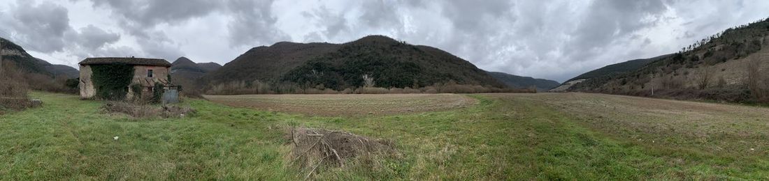 Panoramic view of landscape and mountains against sky