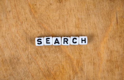 Directly above shot of sign board on table