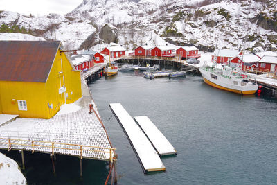 Ship moored in river during winter