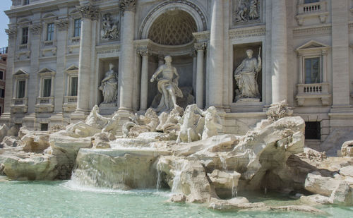 Fountain in front of historical building