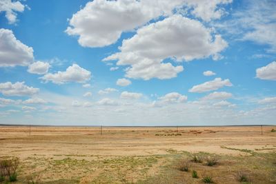 View of landscape against blue sky