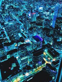 High angle view of illuminated cityscape at night