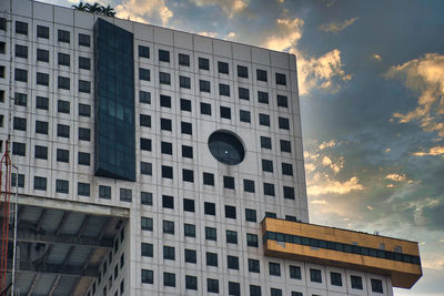 Low angle view of modern building against sky