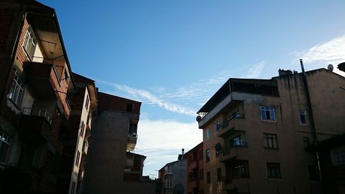 Low angle view of building against blue sky