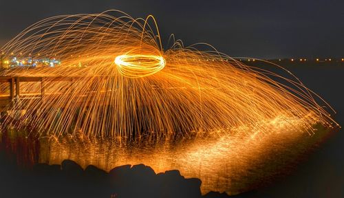 Firework display at night