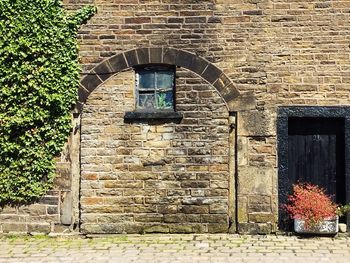 View of window on brick wall