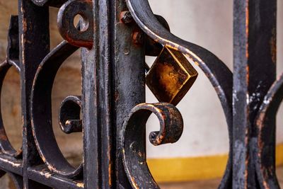 Close-up of rusty gate