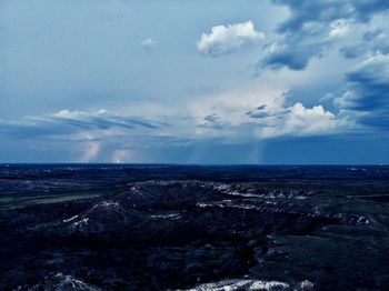 Scenic view of land against sky