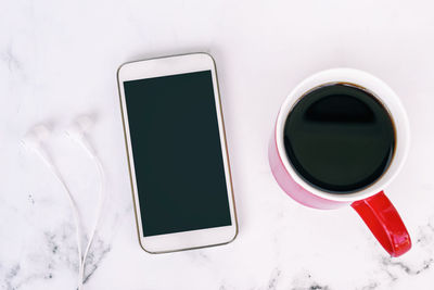 Directly above shot of coffee cup on table