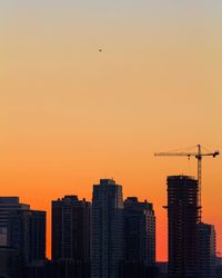 Cityscape against sky during sunset