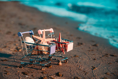 High angle view of shopping cart on beach