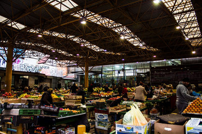 People at market stall