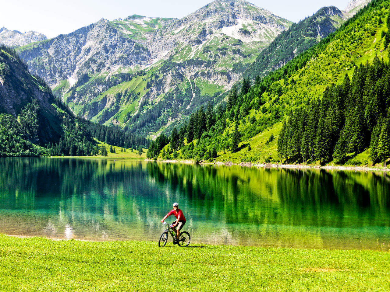 SCENIC VIEW OF LAKE BY MOUNTAINS