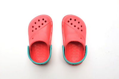 Colorful children's rubber sandals isolated on the white background.children's fashion slippers