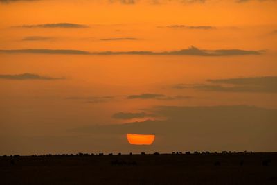 Scenic view of landscape against sky during sunset