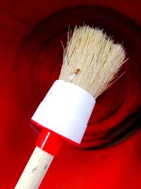 High angle view of paintbrushes on white background
