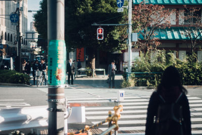 Rear view of man on road