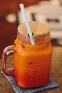 Close-up of drink in jar on table