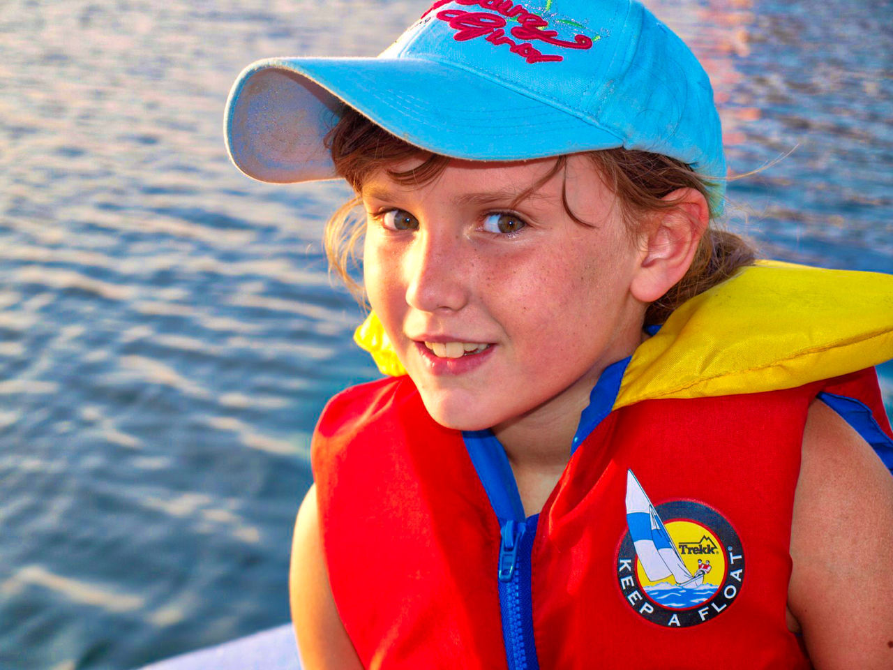 PORTRAIT OF A SMILING YOUNG MAN