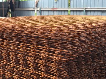 Close-up of wicker basket on construction site