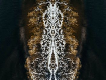 Close-up of water over black background