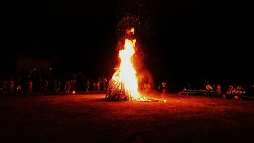 Illuminated bonfire at night