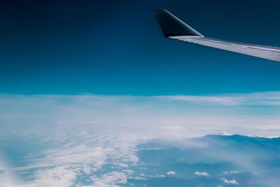 Aerial view of clouds over blue sky