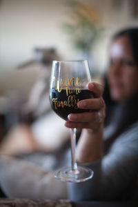 Close-up of man drinking glass