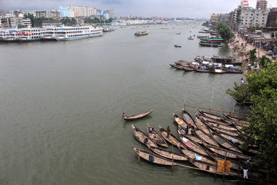 High angle view of river by buildings in city