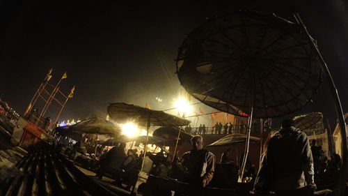 People enjoying at amusement park