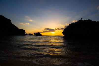 Scenic view of sea against sky during sunset