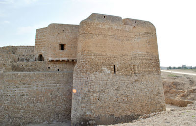 Old ruin building against sky