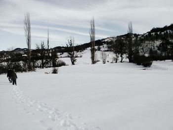 Scenic view of snow covered mountains