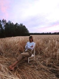 Full length of woman on field against sky