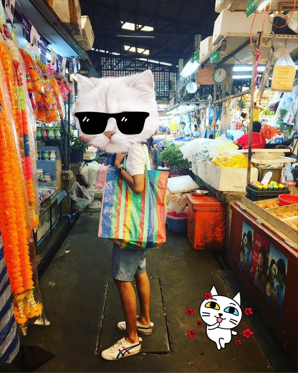 FULL LENGTH OF MAN STANDING IN MARKET STALL