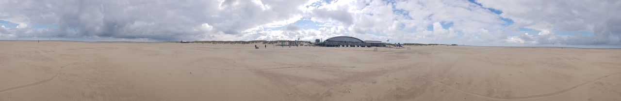 Panoramic view of desert against sky