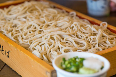 Close-up of noodles served in bowl on table