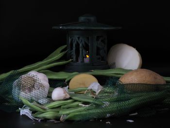 Close-up of mushrooms against black background