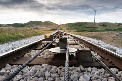 Train on railroad track against sky