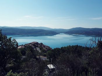 Scenic view of mountains against blue sky